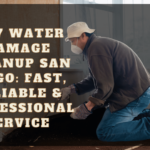 24/7 Water Damage Cleanup San Diego: Professional water damage cleanup team in action, extracting water and drying a flooded home in San Diego.